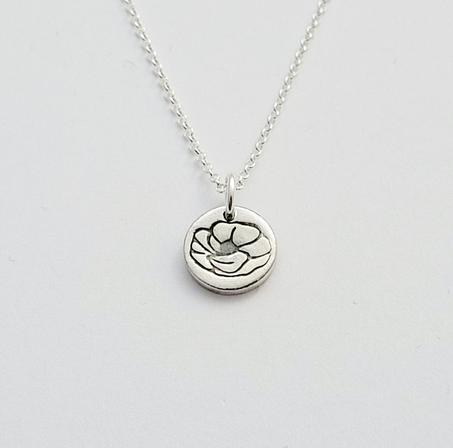 Sterling-silver-tiny-poppy-flower-pendant-necklace-1