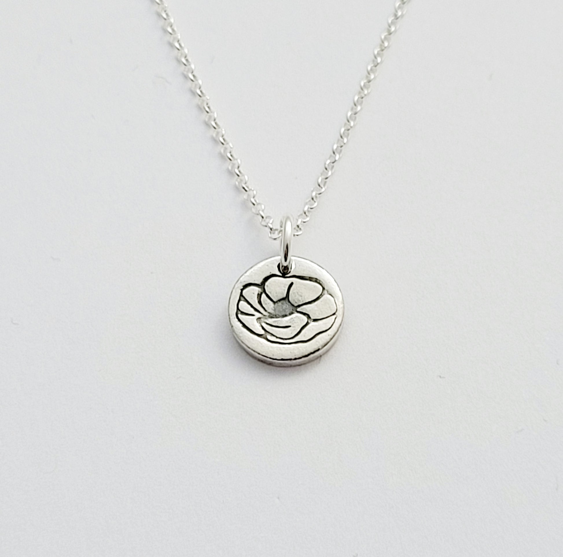 Sterling-silver-tiny-poppy-flower-pendant-necklace-1